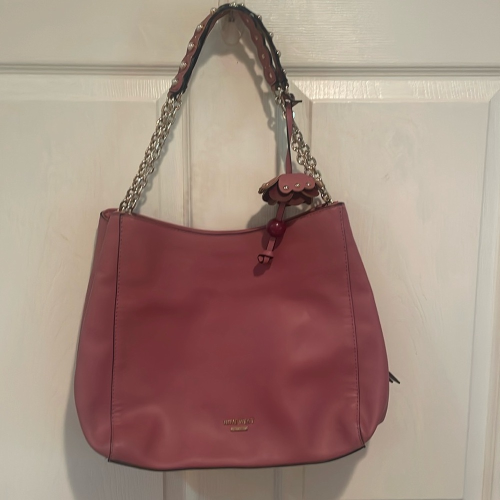 Nine West pocket book.